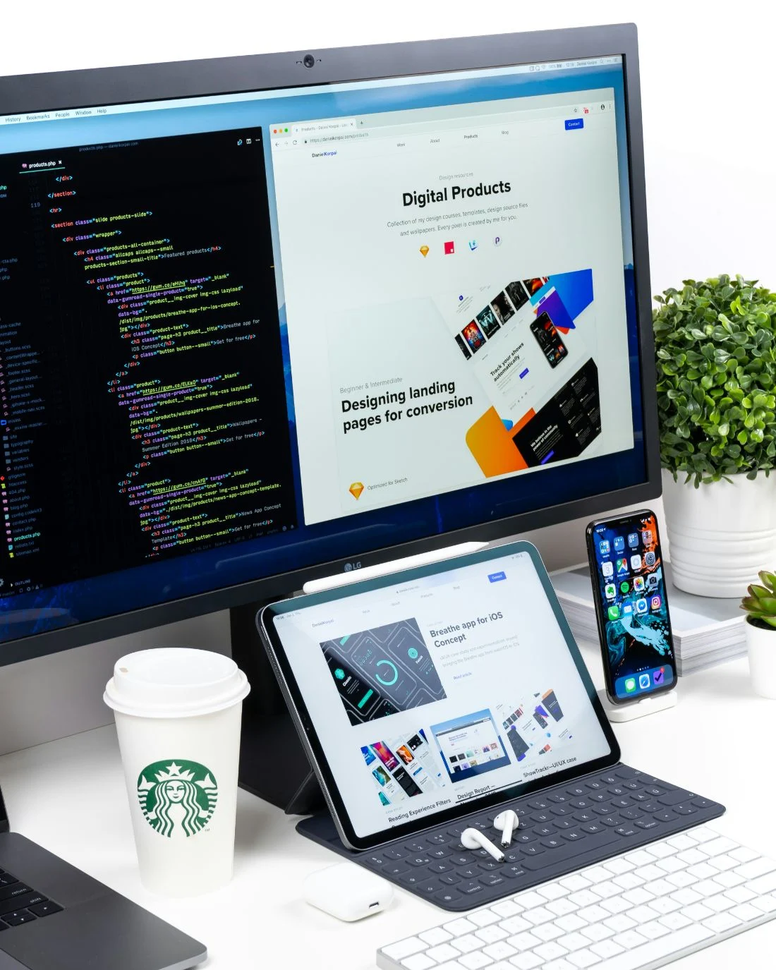 A responsive website shown on a desktop monitor, tablet, and phone beside the site code