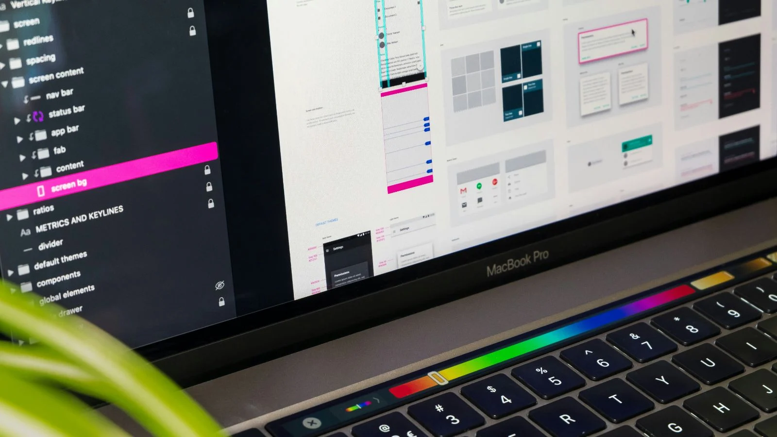 A website layout in progress in a design app on a laptop screen